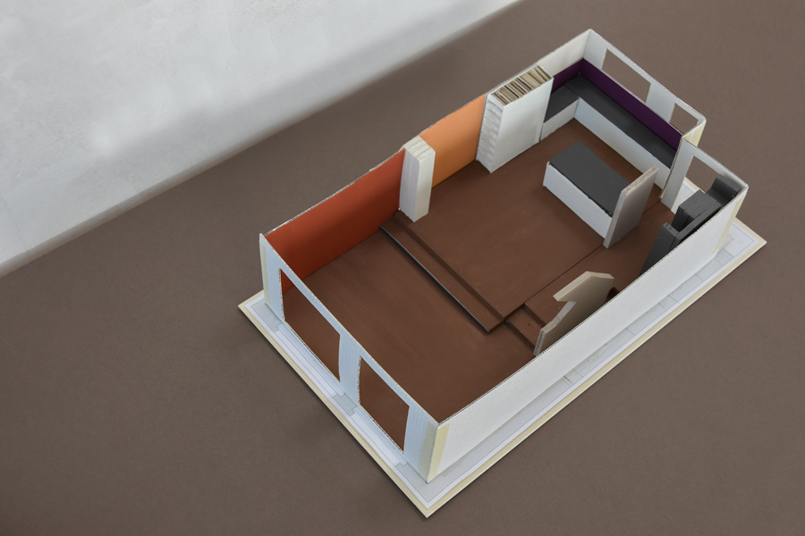 Das Bild zeigt das Raummodell mit der Farbgestaltung für einen Wohnraum mit Wohnbereich, Essbereich und offene Küche.